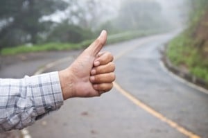 Hitchhiker raising thumb