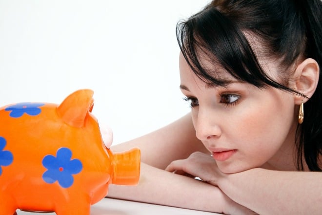 woman piggy bank 401k savings