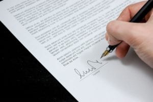 signing a contract for renting an apartment