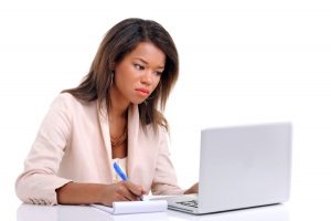 woman working on laptop for salary