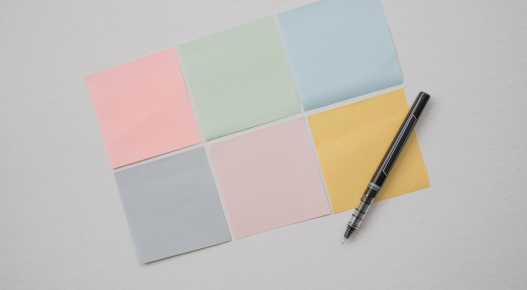 sticky notes and pen