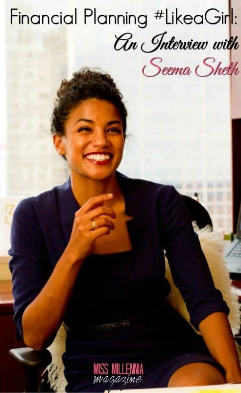 a woman smiling and sitting in a chair