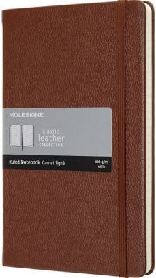 moleskin notebook with brown cover