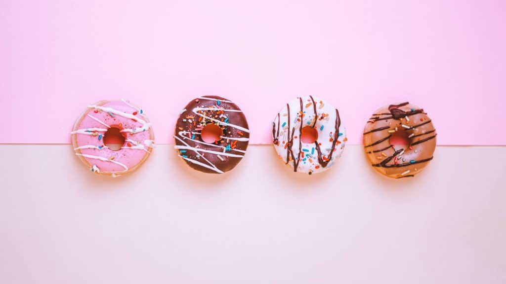 A line of sprinkled donuts