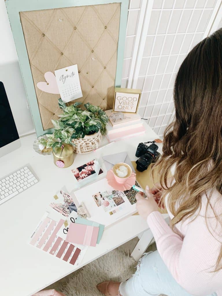 A business owner ensuring her brand stands out by picking the perfect color palette