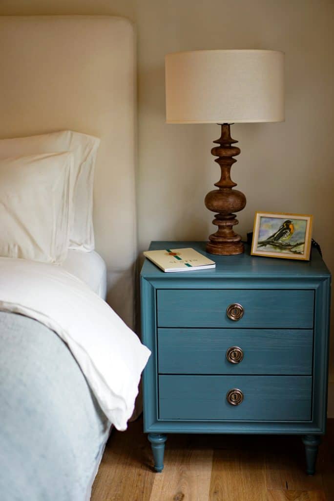 A nightstand can hold many things needed throughout the night! 